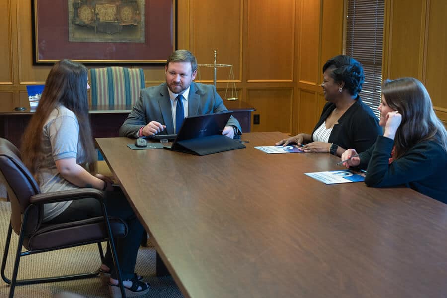 Brock & Stout team meeting